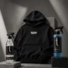 Zwarte Buitenhuis Products hoodie met fles Dissolve degreaser en Refract Ceramic Quick Coat
